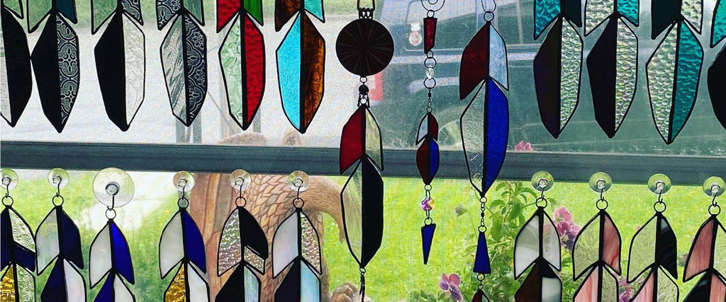 Too Bright To Be Caged: The Story of the Stained Glass Feather Project